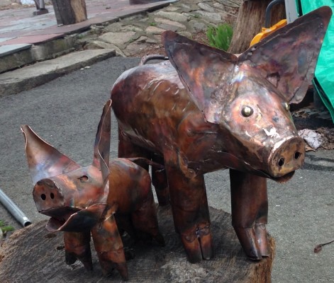 Copper Sculpture of Mom and Baby pig on wooden stump